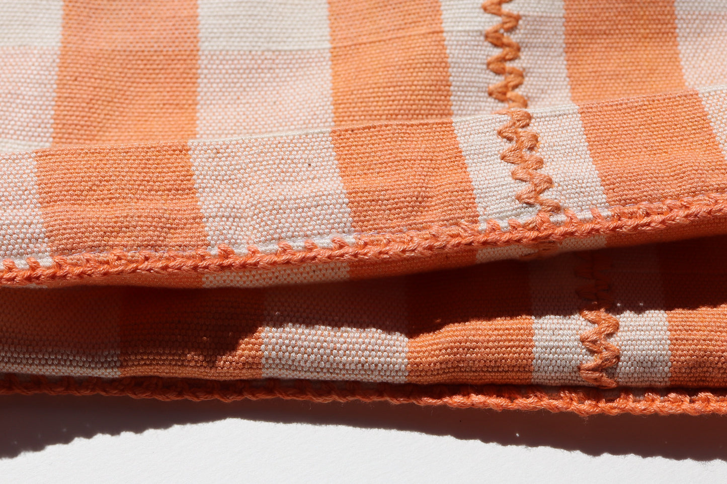 HANDWOVEN SHORTS IN ORANGE GINGHAM